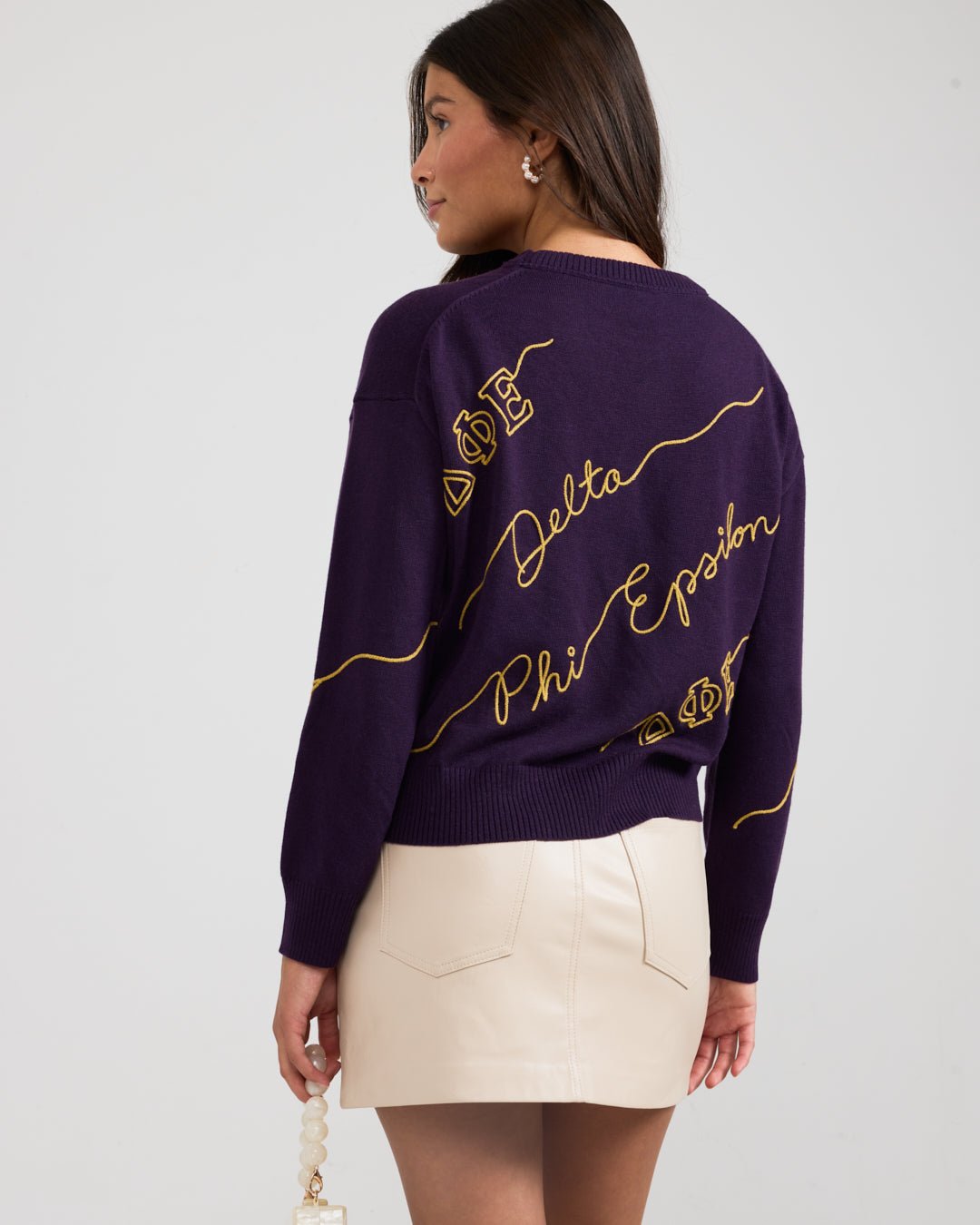 purple and gold crewneck sorority sweater with Delta Phi Epsilon embroidered logo, perfect for sorority recruitment