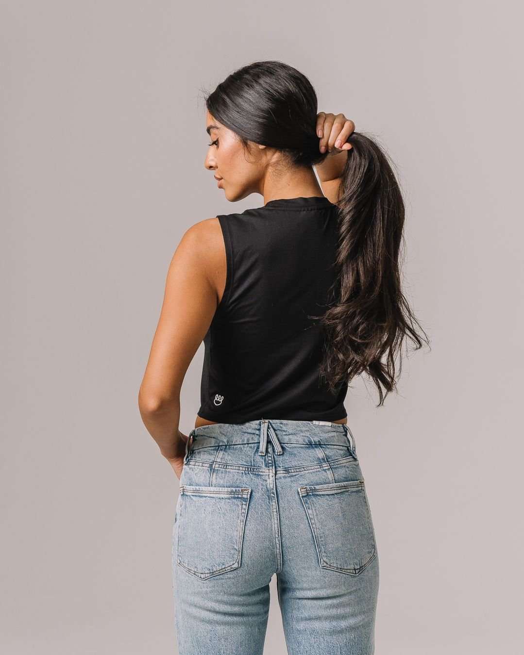 Black empower tank, perfect for workouts, tailgates, or game day style.