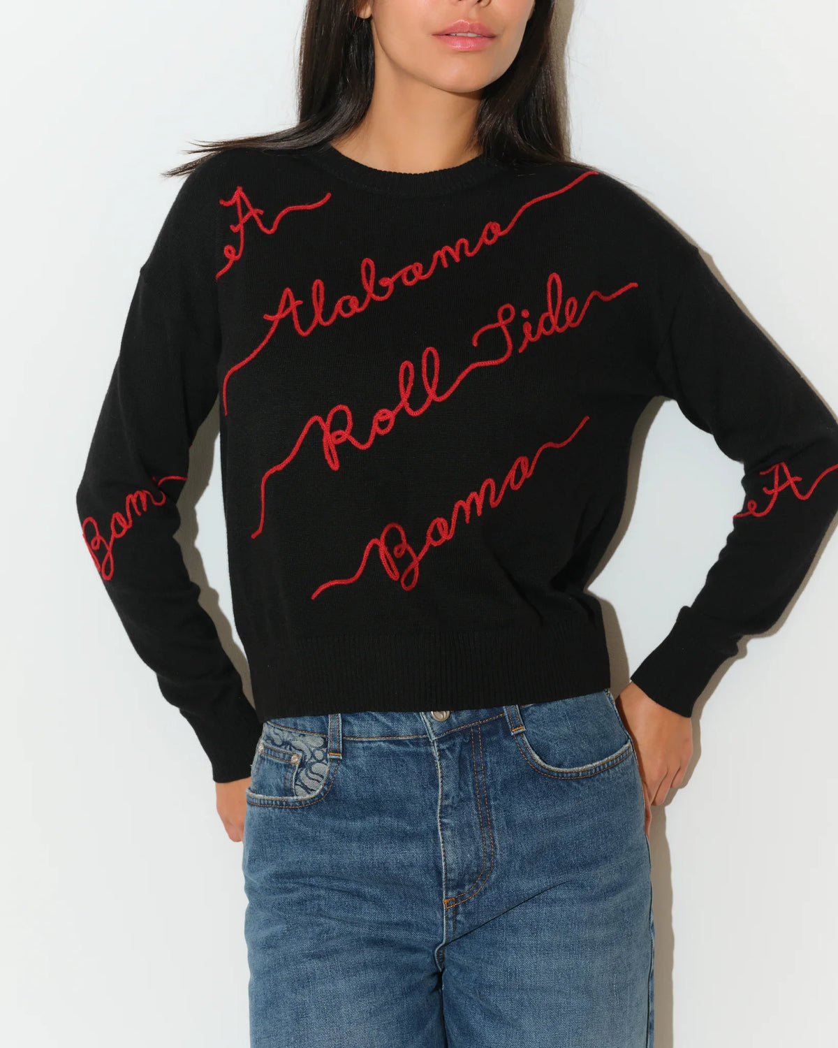 Black Alabama Crimson Tide Love Letter Sweater with red cursive script reading "Alabama," "Roll Tide," and "Bama" across the front and sleeves.