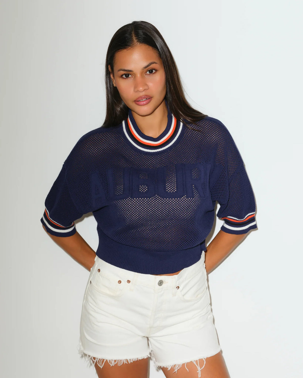 Navy Auburn Tigers cardigan sweater in burgundy with tan and white chest stripes, button-front styling, and embroidered team branding on the chest and hem.