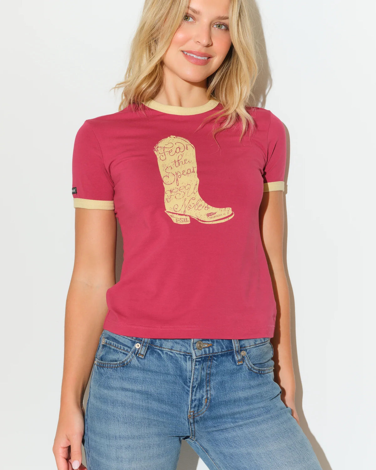 Maroon Florida State Seminoles women's ringer tee with gold trim and a large embroidered-style cowboy boot graphic on the chest.