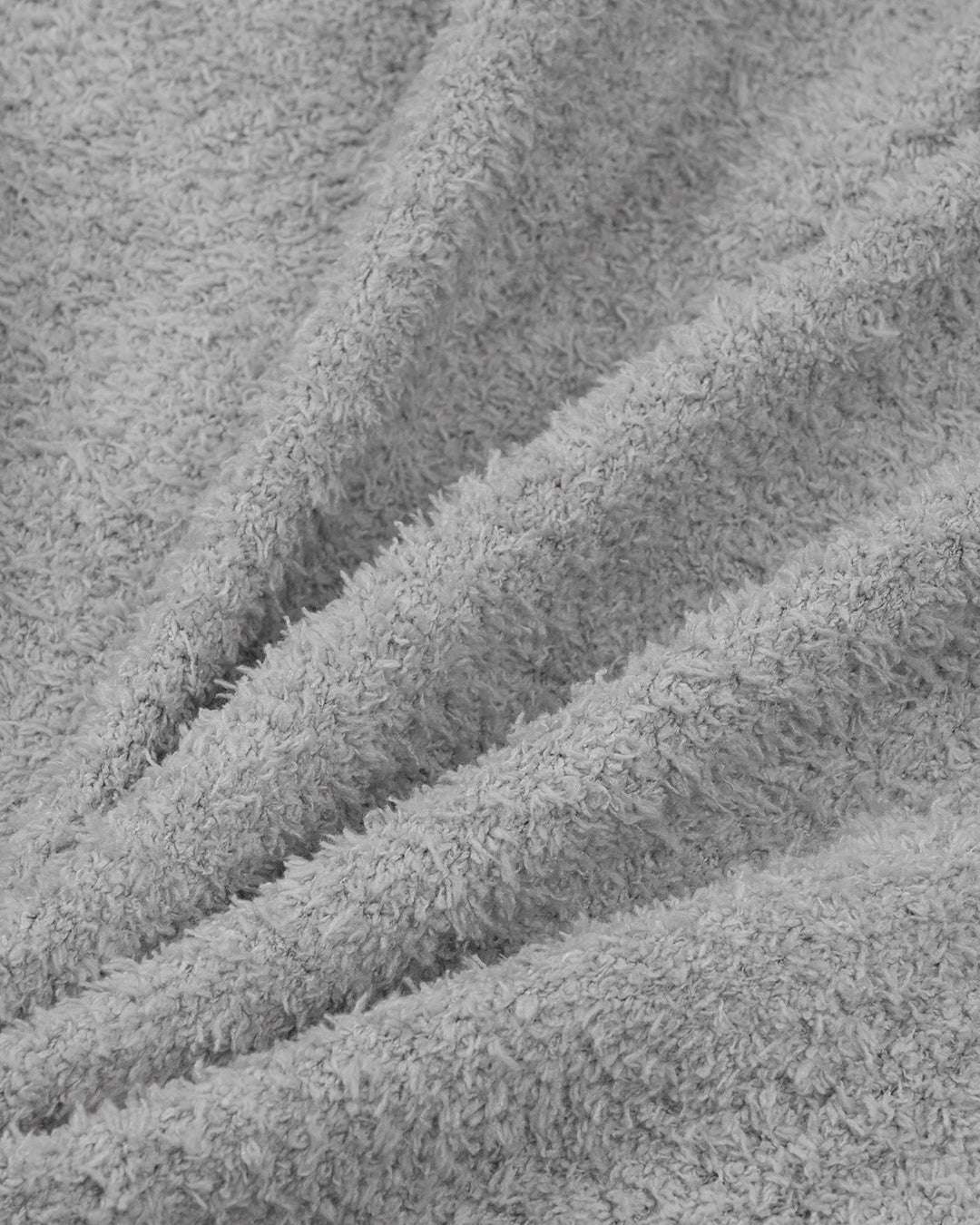 gray fuzzy knit set, perfect for lounging on game day.