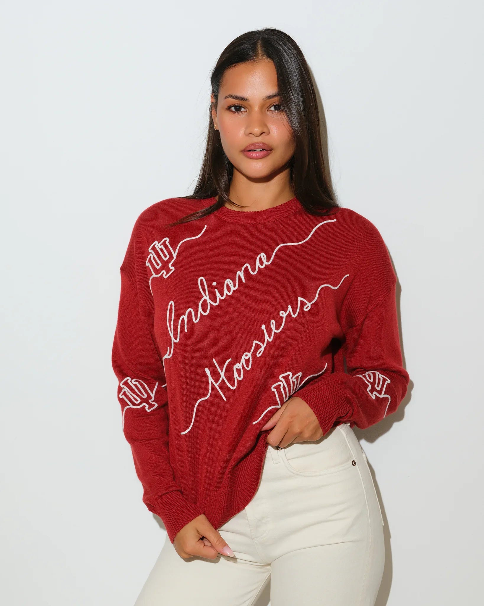 Crimson Indiana Hoosiers crewneck sweater with white script "Indiana Hoosiers" lettering and hand graphic across the front.