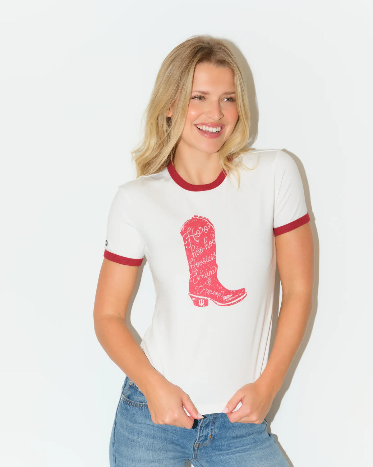 Crimson and white Indiana Hoosiers ringer tee featuring a bold red cowboy boot graphic on the chest with crimson collar and sleeve trim.