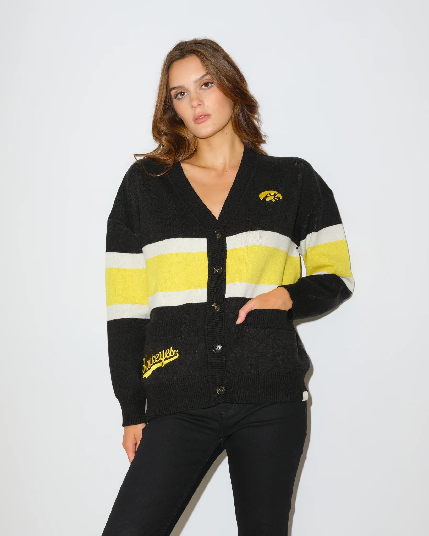 Black Iowa Hawkeyes Vinti Cardi cardigan with colorblock stripes and an embroidered retro football helmet logo at the chest.