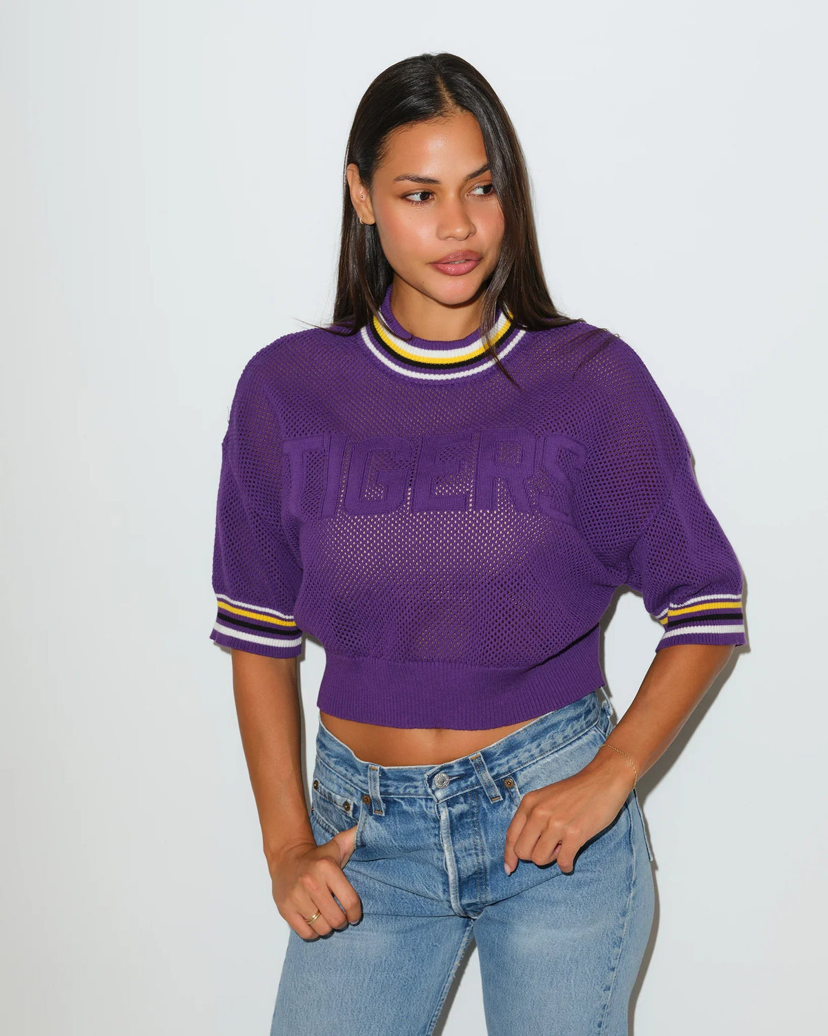 Purple LSU Tigers cropped summer sweater with "TIGERS" lettering across the chest and gold and white striped ribbed collar and cuffs.