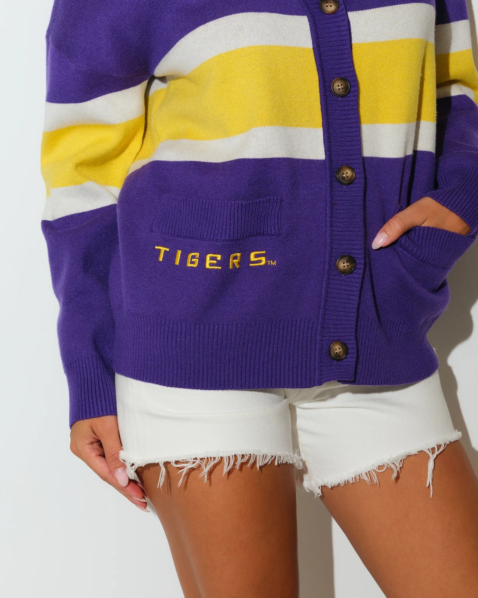 Purple LSU Tigers Vinti cardigan sweater with Louisiana state outline graphic and gold and white stripe detailing across the back.