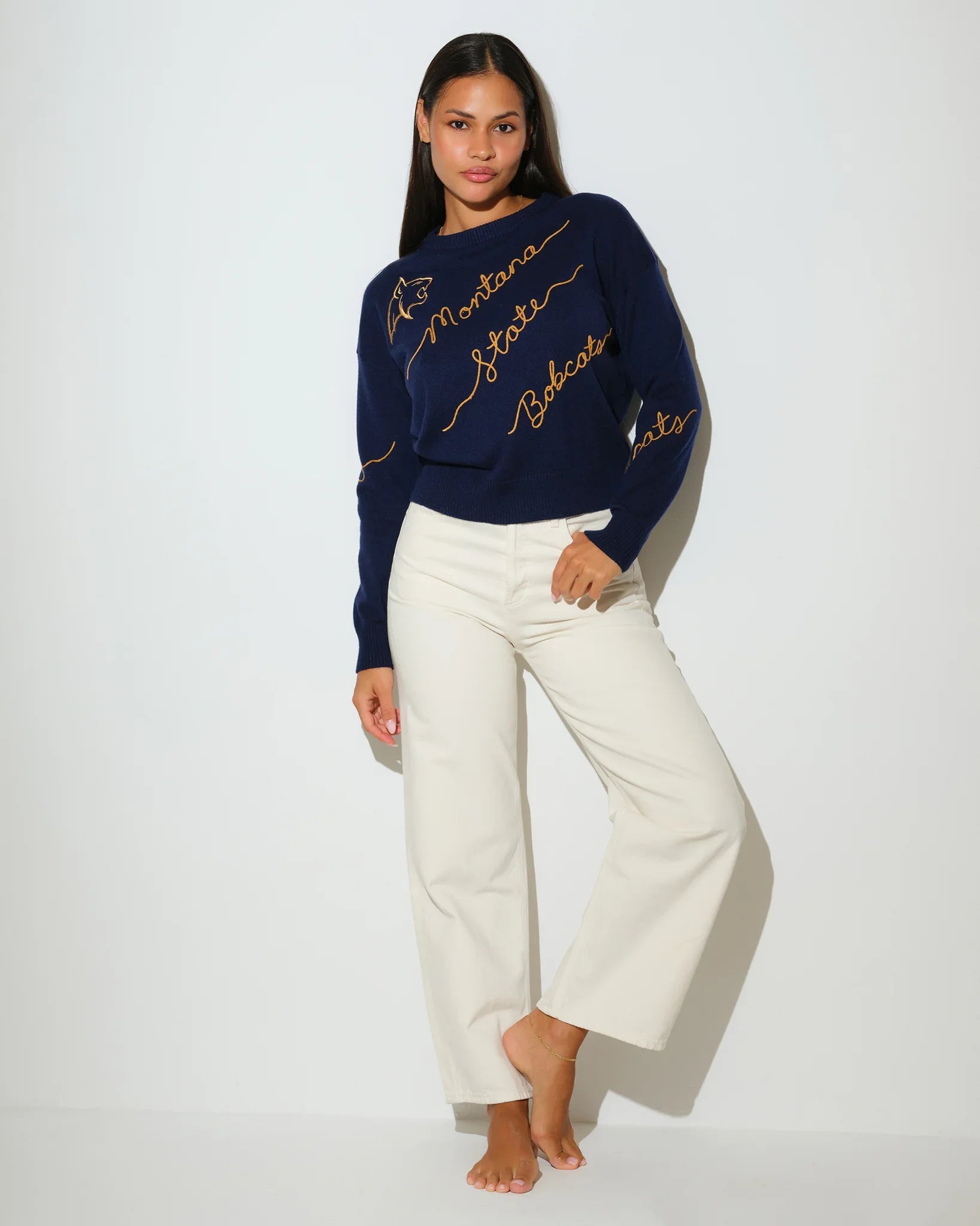 Navy Montana State Bobcats women's crewneck sweater with gold script "Montana State Bobcats" lettering across the front.