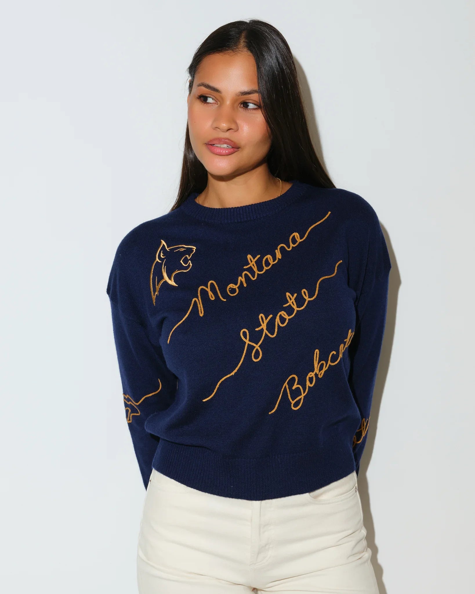Navy Montana State Bobcats women's crewneck sweater with gold script "Montana State Bobcats" lettering across the front.