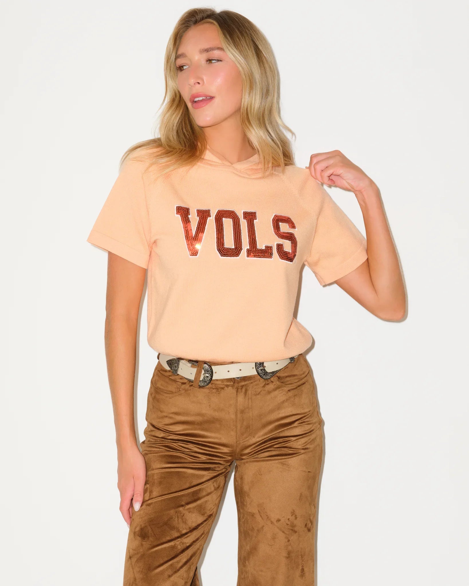 Tennessee Orange short sleeve knit hoodie featuring bold "VOLS" lettering across the chest in Tennessee team colors.