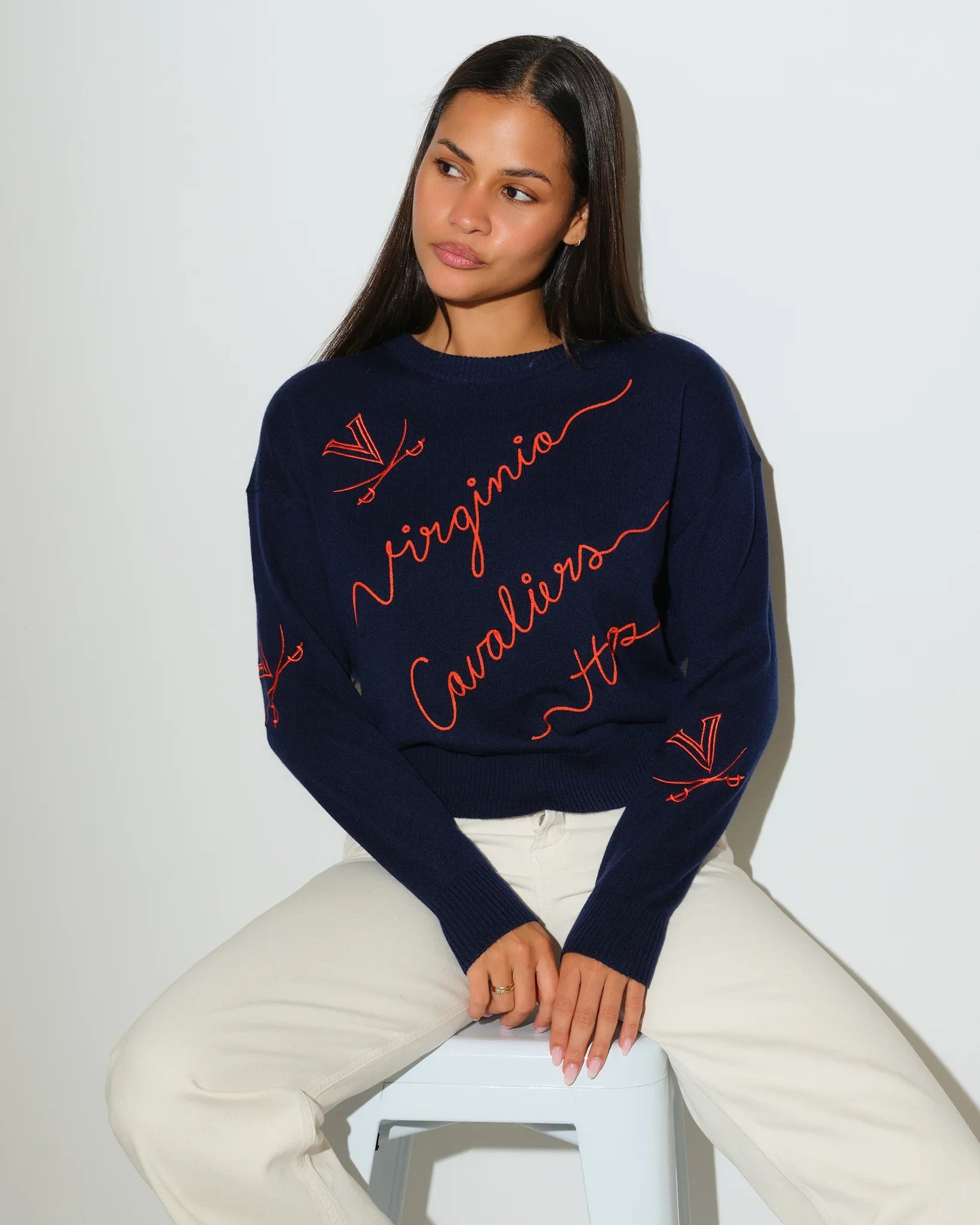 Navy Virginia Cavaliers crewneck sweater featuring red cursive "Virginia Cavaliers" script and logo details throughout.