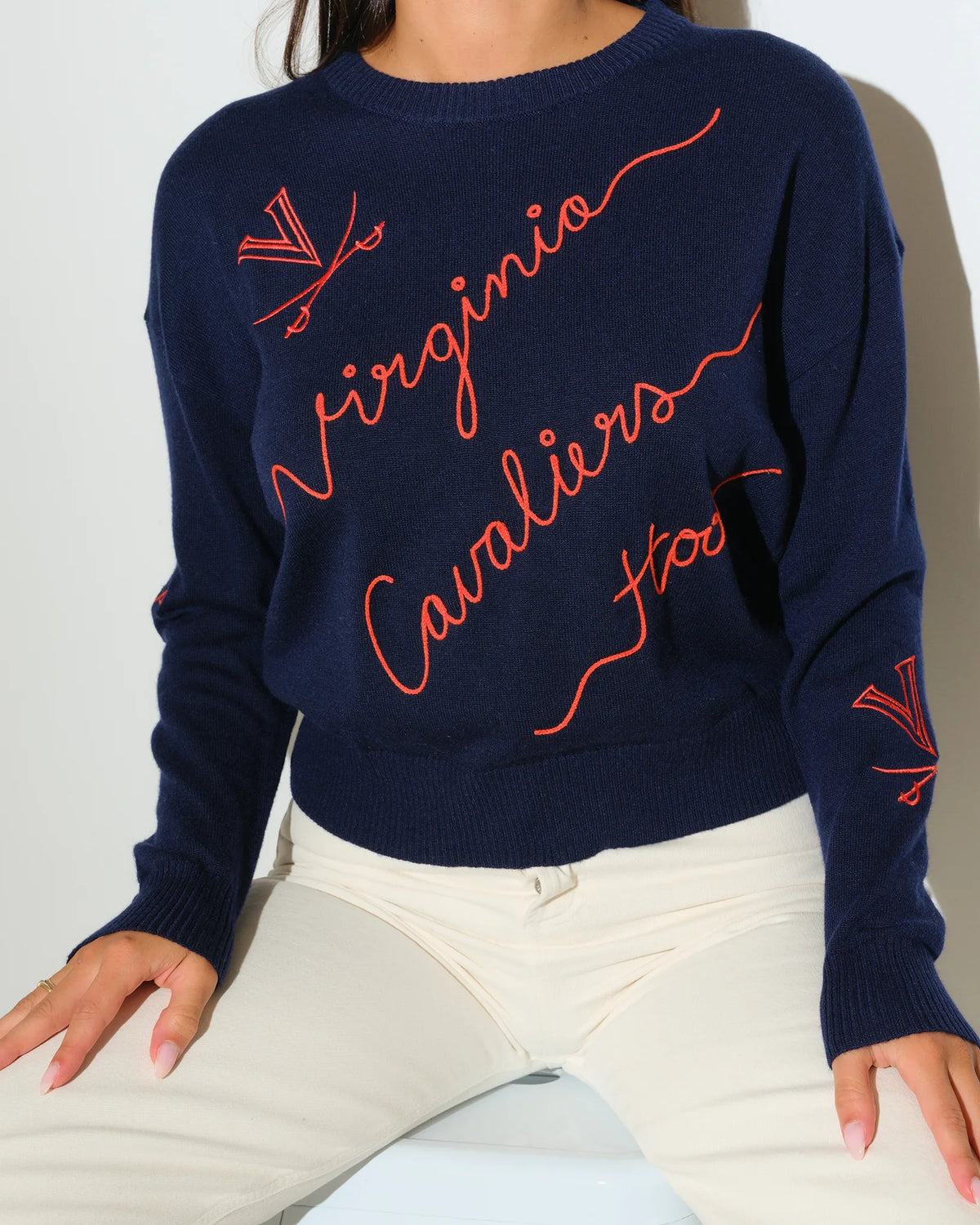Navy Virginia Cavaliers crewneck sweater featuring red cursive "Virginia Cavaliers" script and logo details throughout.