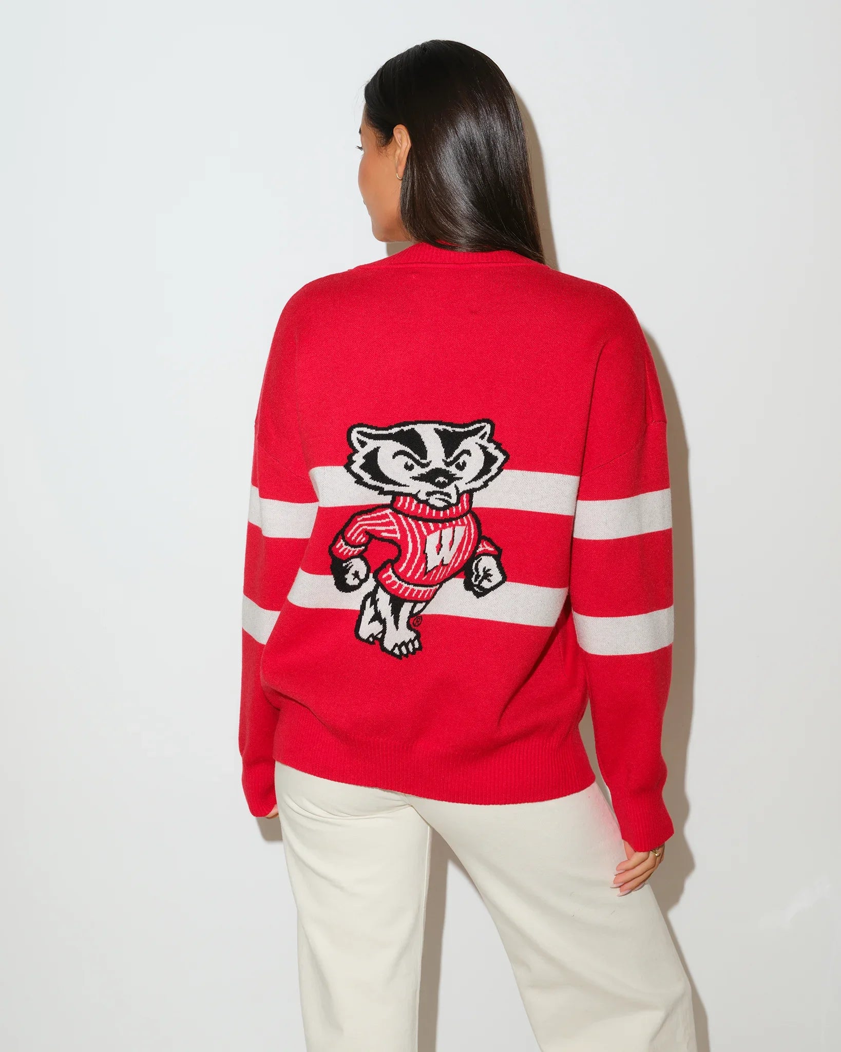 Red Wisconsin Badgers Vinti cardigan with white chest stripes, V-neck, button front, and embroidered "W" logo on the left chest.