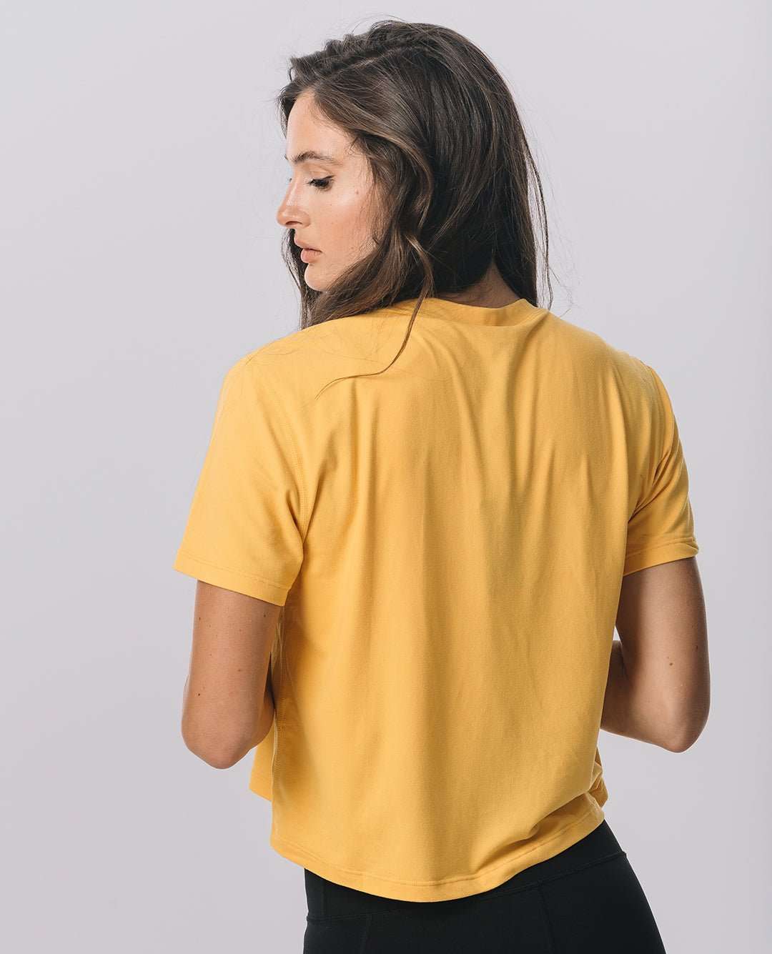 Yellow crop tee, lightweight and perfect for game day style.