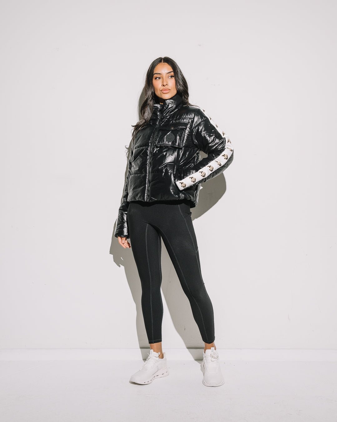 Black cargo puffer jacket with Colorado Buffaloes arm tape logo, warm and perfect for game day or outdoor wear.