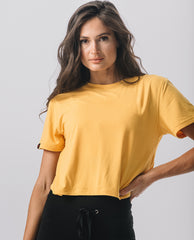 Front view of KADYLUXE® Milky Silk™ Crop Tee in Golden Yellow