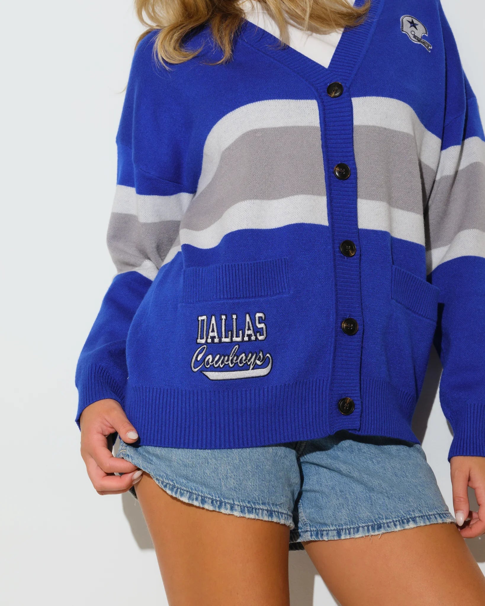 Royal, gold, and white colorblock Dallas Cowboys Vinti Cardi with a V-neckline and embroidered vintage helmet logo on the chest.
