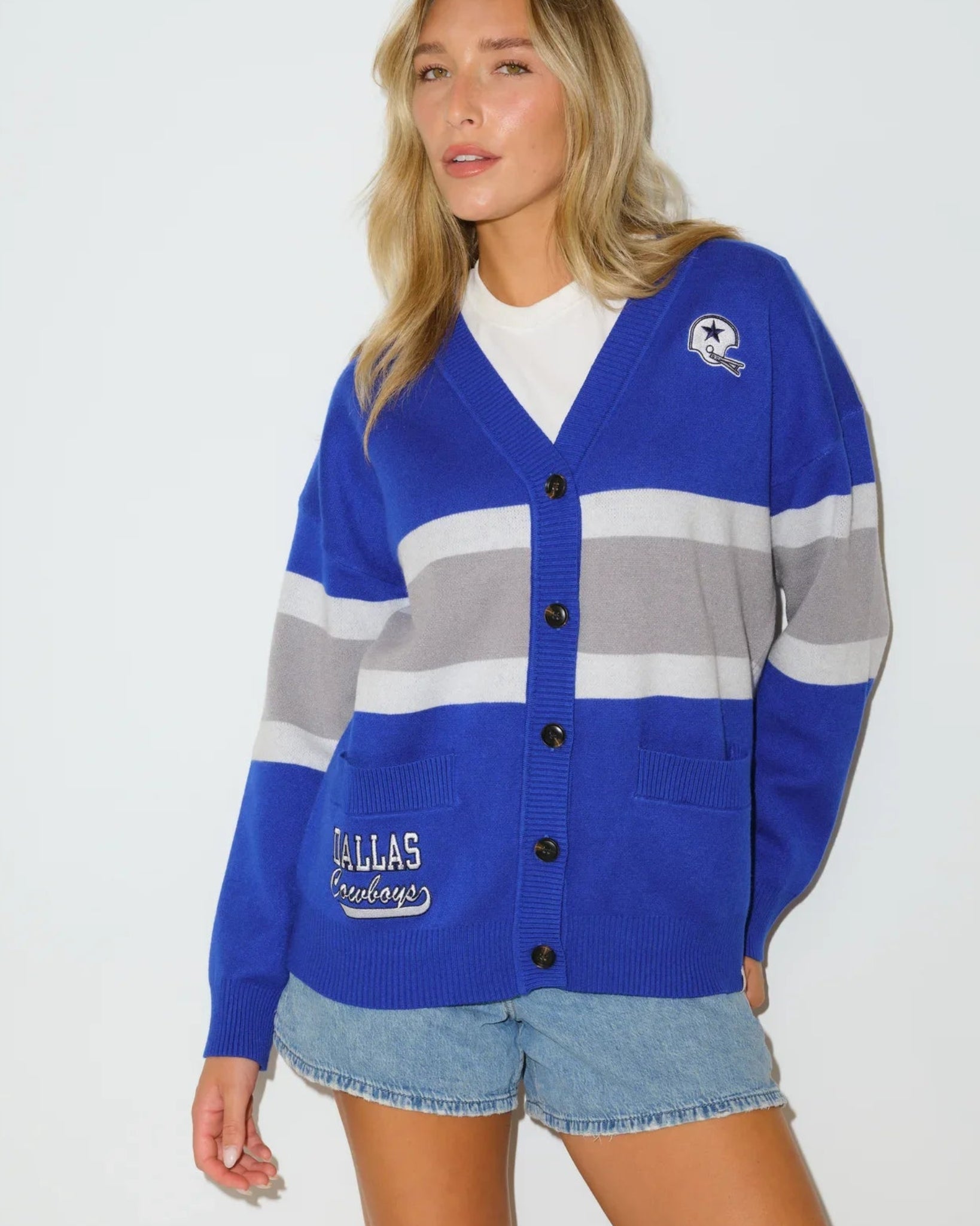 Royal, gold, and white colorblock Dallas Cowboys Vinti Cardi with a V-neckline and embroidered vintage helmet logo on the chest.