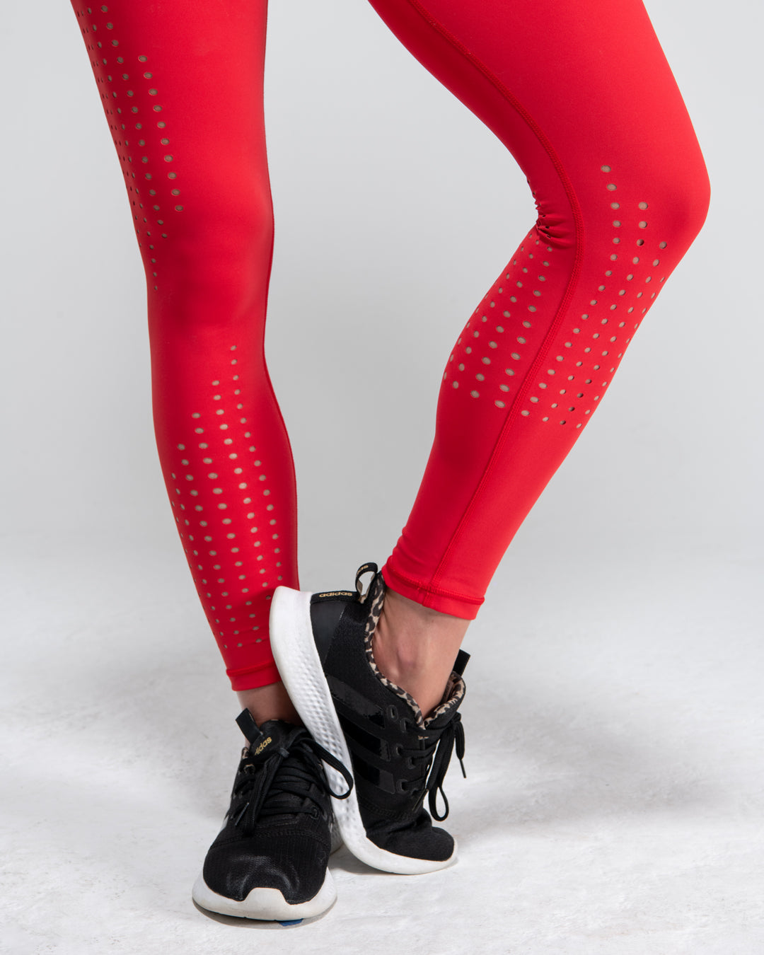 kadyluxe-womens-activewear-legging-red-laser-punch-out-holes