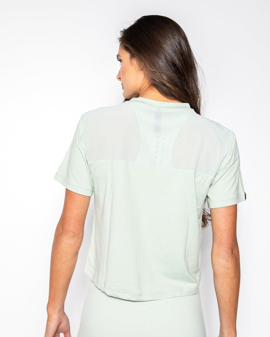 KADYLUXE® Milky Silk pocket crop tee in mint back view.