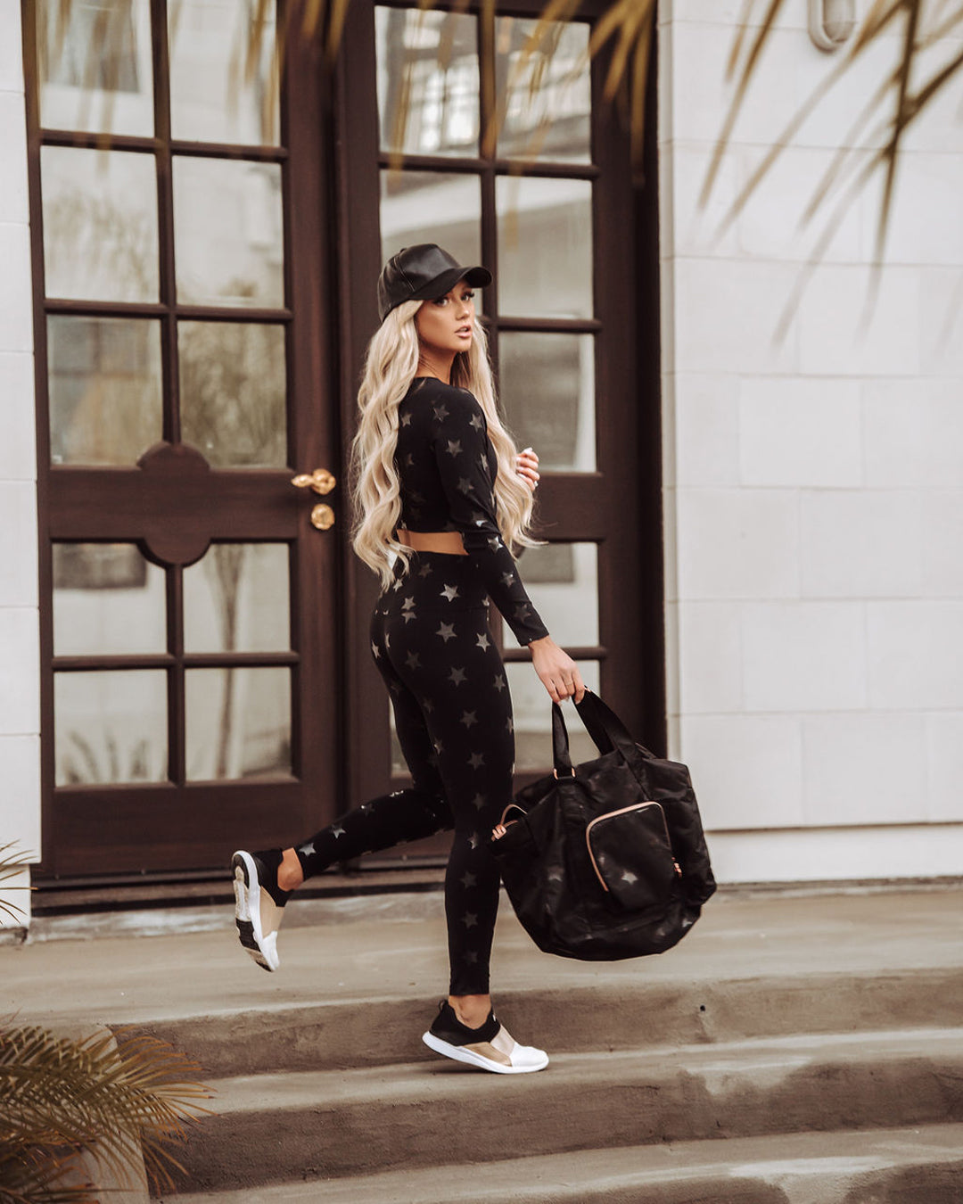 KADYLUXE® black star tonal legging outfit and matching bag.