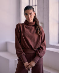 Front view of KADYLUXE® Corduroy Turtleneck Pullover in Root Beer