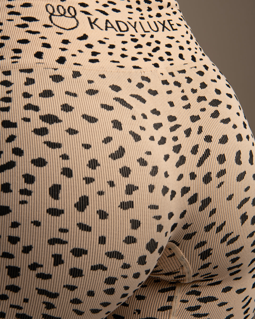 KADYLUXE® womens seamless cheetah biker short close up detail.