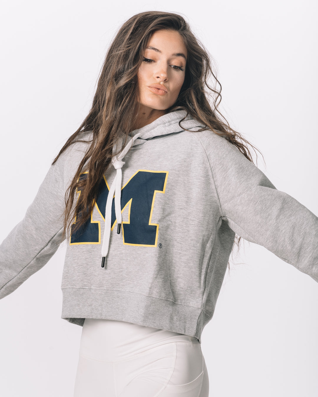 Front view of KADYLUXE® Michigan Wolverines™ Cozy Crop Hoodie in Heather Grey