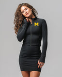 Front view of KADYLUXE® Michigan Wolverines™ Cropped Sports Zip Jacket in Black