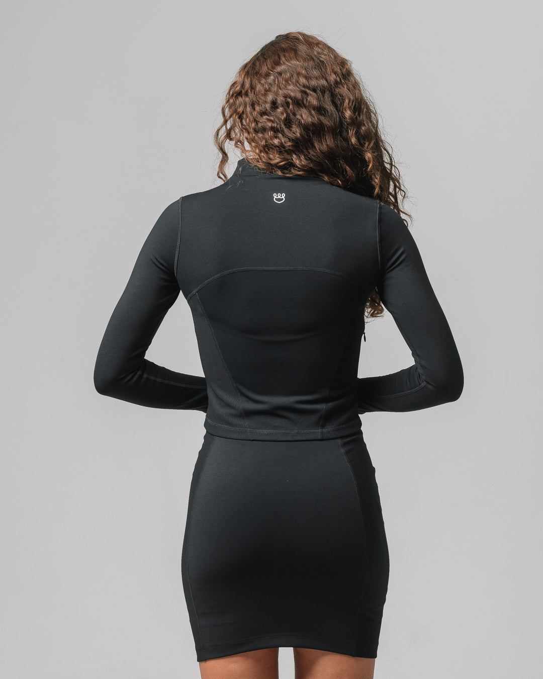 Back view of KADYLUXE® Midi Sports Jacket in Black